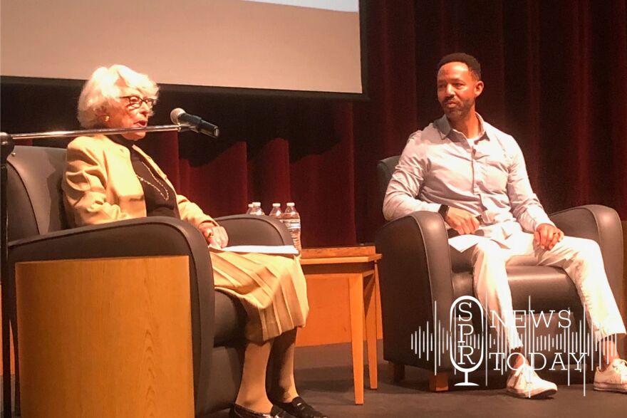 Carla Peperzak speaks to Ferris High School students with Andre Wicks, the principal of Spokane's Peperzak Middle School, in 2022.