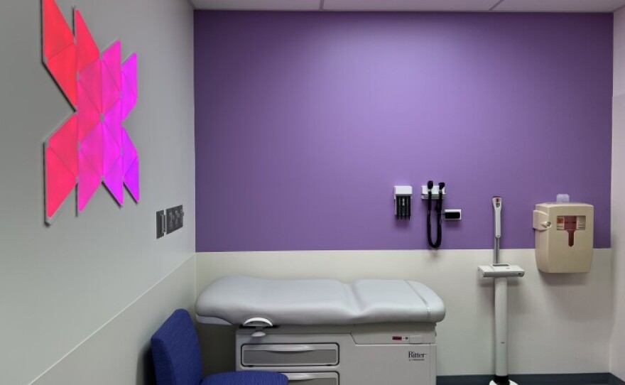 The new center has colorful art work and sensory features to make patient experience better.