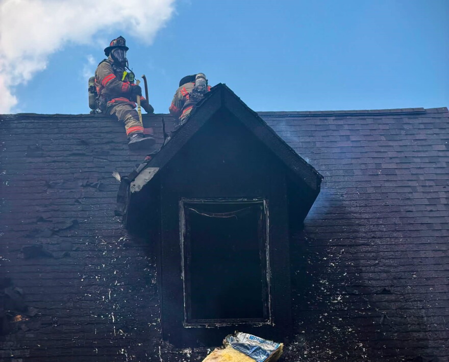 Evansville firefighters on the roof as fire damages a home in the 1700 block of Southfield Road, Sept. 2, 2026