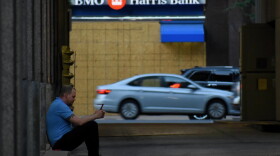 A worker in downtown Indianapolis takes a smoke break.