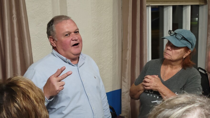 Erie County Republican Elections Commissioner Ralph Mohr speaks with attendees following a New York Citizens Audit presentation Sept. 26, 2022.