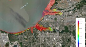 An overhead digital view of part of Anchorage, with red color-coding to show the maximum extent of a potential tsumami.