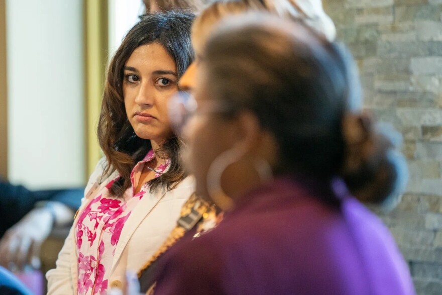 Democratic Rep. Yara Zokaie listens as Assistant House Majority Leader Jennifer Bacon tells caucus members the process they expect to follow on Friday, August. 22, 2025 in seeking a formal House censure of Republican Rep. Ryan Armagost.