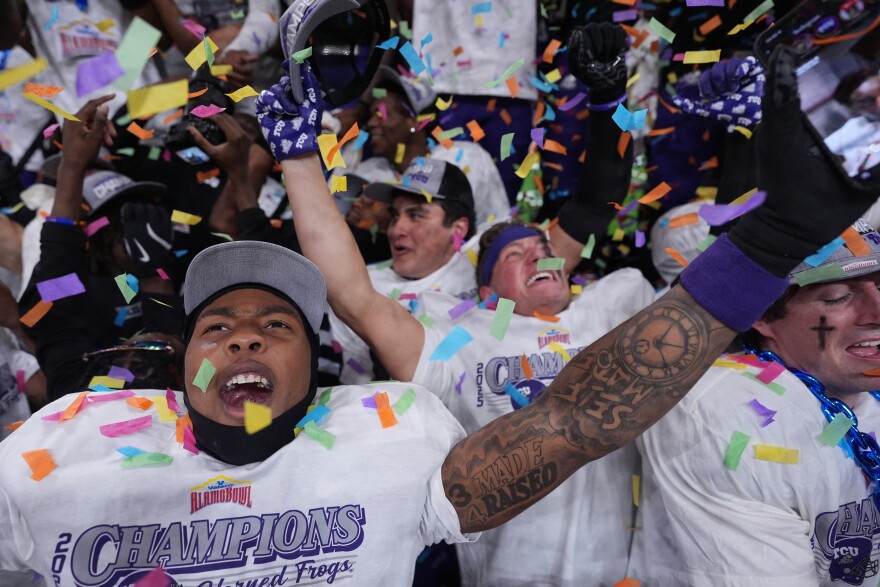 TCU players celebrate their win over Southern California in the Alamo Bowl NCAA college football game in San Antonio, Tuesday, Dec. 30, 2025.