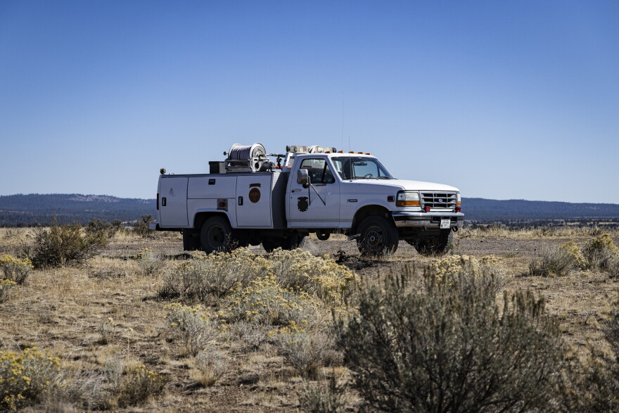 A rangeland fire protection association retrofitted truck sits near the Second Flat Fire burn scar.