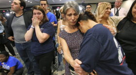 Erika Smith, second from right, consoles Gisela Alvarez, right, at the Nelson for U.S. Senate election night party, in downtown Orlando, Fla., Tuesday, Nov. 6, 2018, as supporters react to results in the election. Republican challenger Rick Scott claimed victory but Nelson is calling for a recount. (Joe Burbank/Orlando Sentinel)