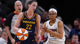 Indiana Fever guard Caitlin Clark (22) drives on Atlanta Dream guard Allisha Gray (15) during the first half of a preseason WNBA basketball game in Indianapolis, Thursday, May 9, 2024.
