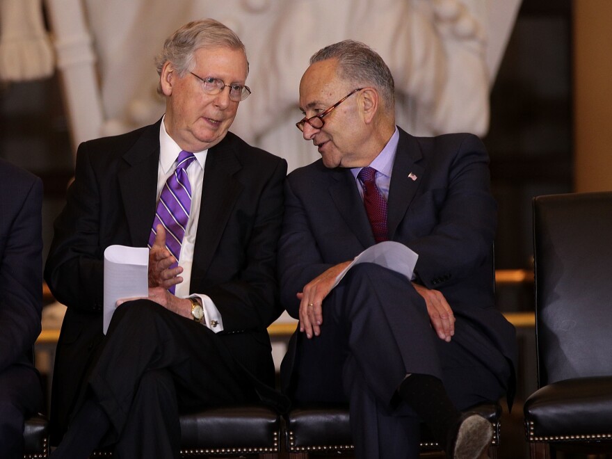 Senate Majority Leader Mitch McConnell (left) chats with Senate Minority Leader Chuck Schumer in October.