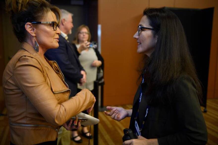 Sarah Palin and Mary Peltola on Wednesday before a U.S. House candidate forum at the Alaska Oil and Gas Association annual conference at the Dena’ina Convention Center in Anchorage.