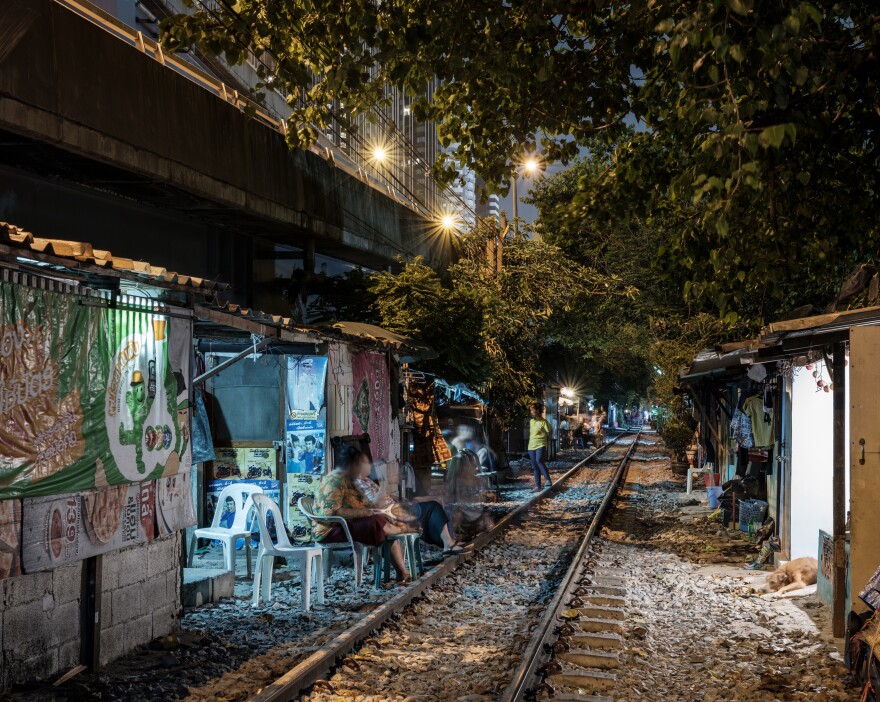 In Bangkok, communities of poor people live under expressways and besides train tracks. They have been especially hard-hit by the economic downturn triggered by Thailand's efforts to suppress COVID-19.