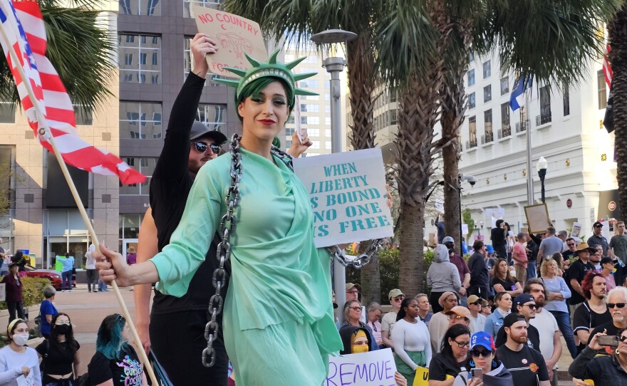 About 500 people from around Central Florida arrived Tuesday evening in front of Orlando City Hall as part of a protest organized by the 50501 Movement. Protesters cited many concerns including President Donald Trump's attitude and policies on DEI, undocumented immigrants, transgender people, the war in Ukraine, and the future of Gaza.