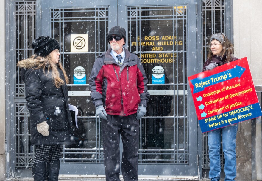 Indivisible Northeast Indiana members leave a meeting with senatorial staff at the E. Ross Adair Federal Building on Jan. 14, 2026.