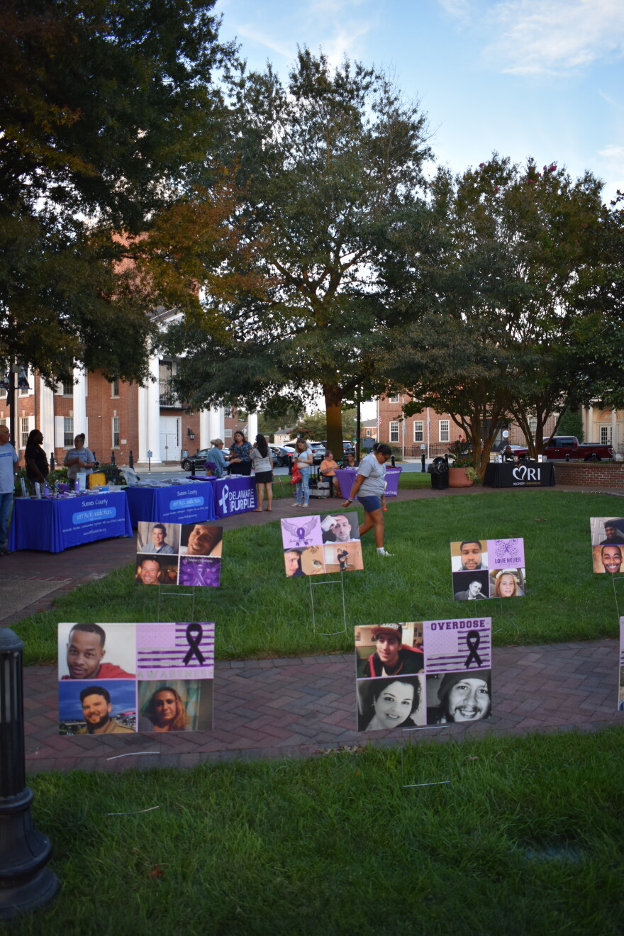 Signs were in the ground across all walkways on the circle, each with photos of a different individual who has died from drug addiction related issues.