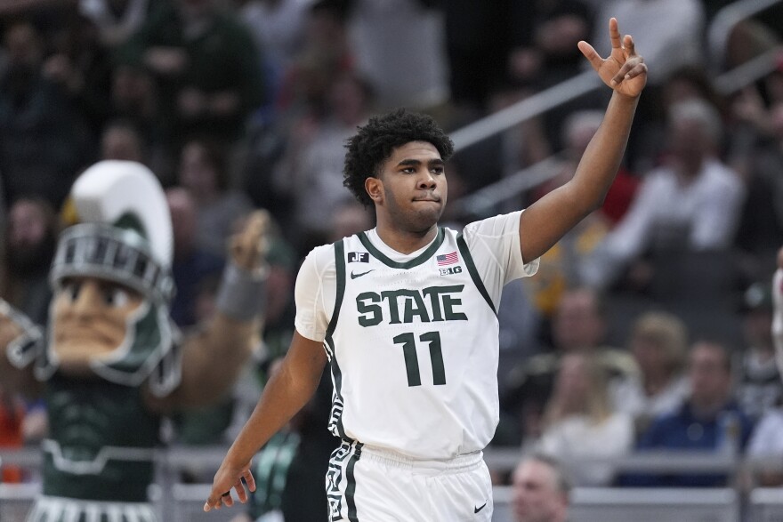 Michigan State guard Jase Richardson (11) reacts to a three-point basket against Oregon during the second half of an NCAA college basketball game in the quarterfinals of the Big Ten Conference tournament in Indianapolis, Friday, March 14, 2025.