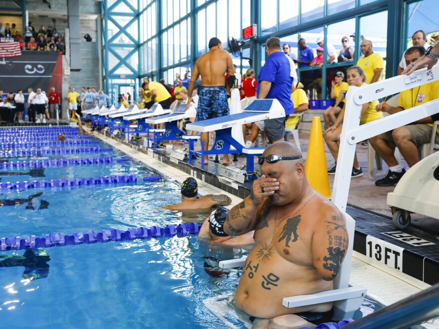Matt gets out of the pool after his race.