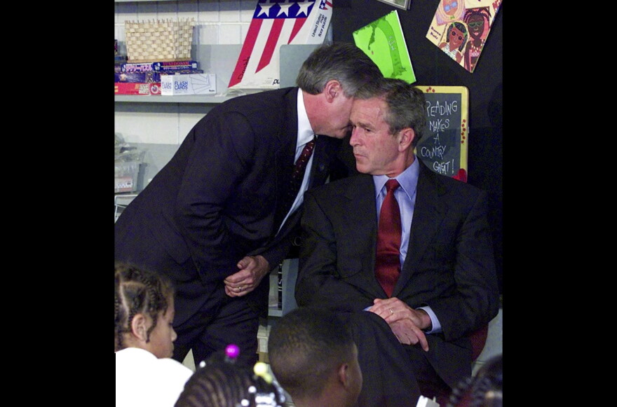 In this Tuesday, Sept. 11, 2001, WUSF file photo, Chief of Staff Andy Card whispers into the ear of President George W. Bush to give him word of the plane crashes into the World Trade Center, during a visit to the Emma E. Booker Elementary School in Sarasota.