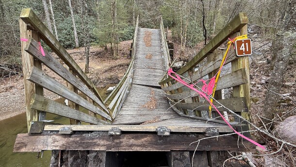 A damaged wooden bridge on the Virginia Creeper Trail, one of 19 bridges that were damaged or destroyed during Helene.