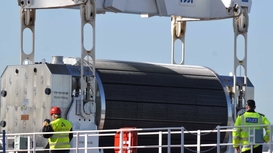 A container of mixed oxide, or MOX, a blend of plutonium and reprocessed uranium, that Japan uses as nuclear fuel for the No. 3 reactor at the Fukushima Dai-ichi plant, is loaded aboard the Pacific Heron ship in the French port of Cherbourg on April 8, 2010.