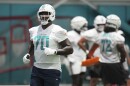 Miami Dolphins offensive tackle Bayron Matos (70) does drills at training camp before he was injured toward the end of practice onWednesday, July 23, 2025, in Miami Gardens.