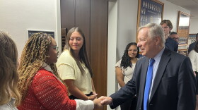 U.S. Senator Dick Durbin (on right) shakes hands with students at Illinois Wesleyan University.