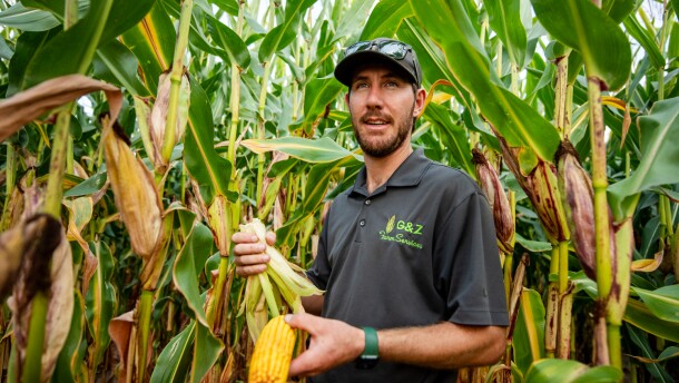 Zac Soltvedt explains how he calculates the amount of corn in a field in Seymour, Wisconsin. He took over the farm from his grandfather.