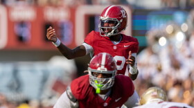 Alabama quarterback Keelon Russell (12) sets up a play against Florida State during the first half of an NCAA college football game Saturday, Sept. 19, 2026, in Tuscaloosa, Ala. (AP Photo/Vasha Hunt)