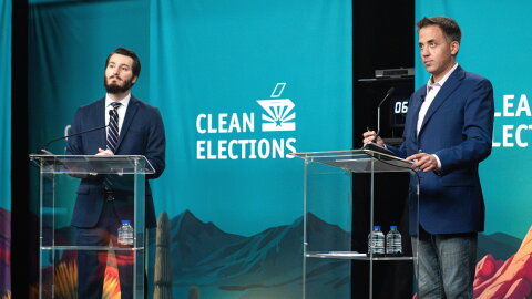 Greg Blackie, left, a supporter of Proposition 144, debates referendum foe Randy Keating Thursday night.