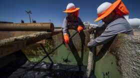 MIDLAND, TX - MAY 5: Workers extracting oil from oil wells in the Permian Basin in Midland, Texas on May 5, 2018. Oil production has been causing a sudden influx of money especially for local Texans despite the consequences to the natural environment.