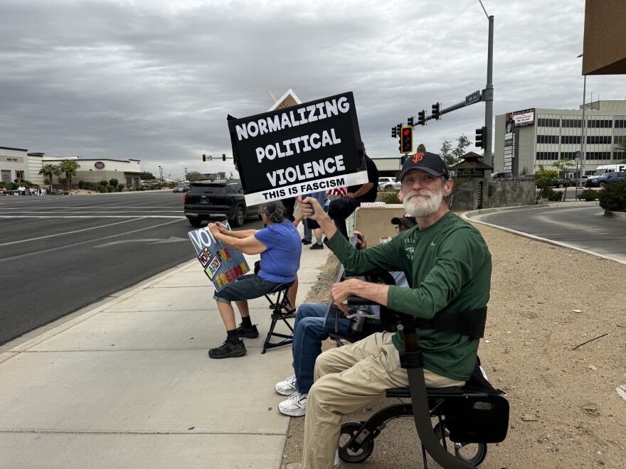 Jack Cowan, holding on to his sign. Jack voted early and attended the No King’s day rally.
