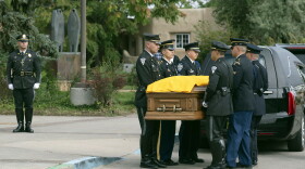 Members of law enforcement from around New Mexico begin to carry the casket of former New Mexico Gov. Bill Richardson outside the New Mexico Capitol building, Wednesday, Sept. 13, 2023.
