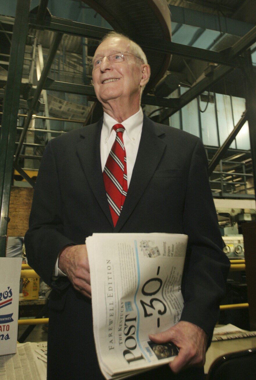 William Keating, former Cincinnati Enquirer publisher, holds one of the final Kentucky Post newspapers off the press in Cincinnati. The former congressman and newspaper executive has died on Wednesday, May 21, 2020 according to his family.