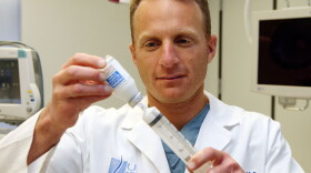 California anesthesiologist Michael Port fills a syringe with the anesthetic propofol in 2009.