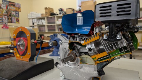 Two cut-away models of an engine and a pump