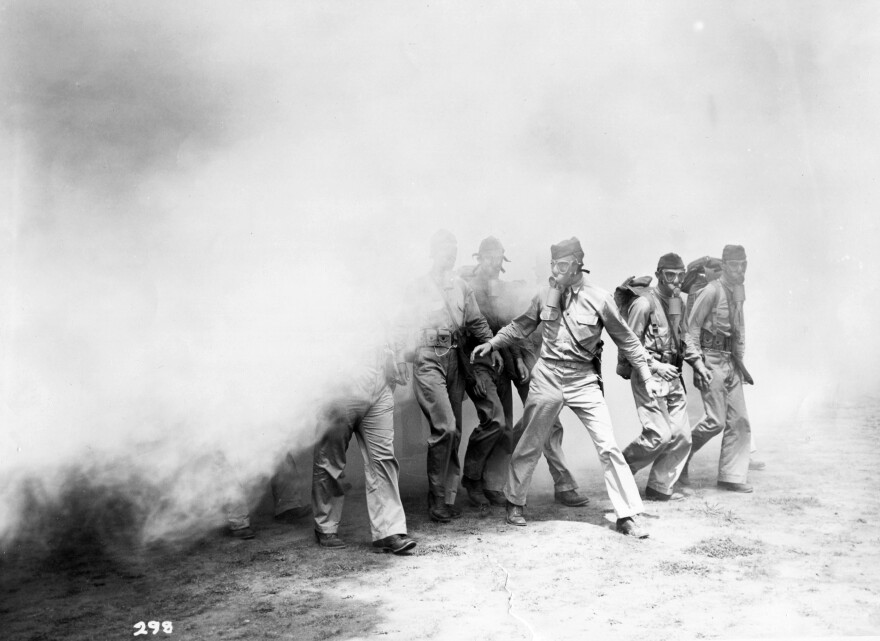 U.S. troops in Panama participate in a chemical warfare training exercise with smoke during World War II.