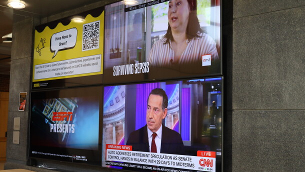 Several news feeds are displayed at the Alder Journalism building on the University of Iowa campus.