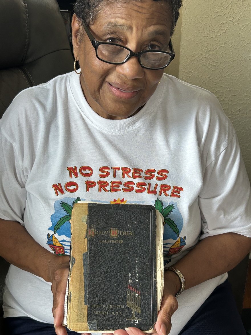 Jackie Skinner Niece of John Moaney Holding Bible Eisenhower Gave Her Grandmother