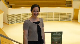 Rebekah O'Brien, founder of the New Ground Orchestra Festival, poses for a portrait in Penn State's Esber Recital Hall on July 16, 2025.