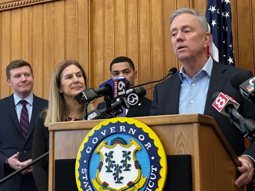 Gov. Ned Lamont talks up coming tax cuts but preaches overall restraint. At left, Comptroller Sean Scanlon, Lt. Gov. Susan Bysiewicz and Treasurer Erick Russell.