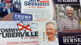 Leaflets for the candidates for a senate seat in Alabama are displayed on a table. Prominent among them is former Alabama Sen. and Attorney General Jeff Sessions.