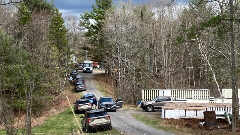 Police on the scene of shootings in Bowdoin that left four people dead on Tuesday.