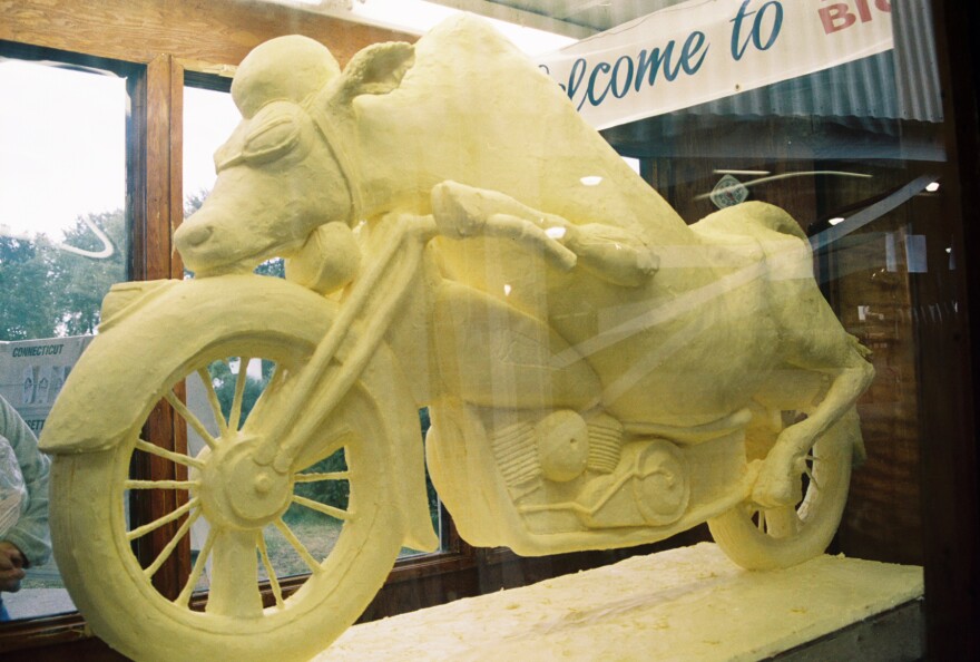 <em>Cow on a motorcycle,</em> by Jim Victor and Marie Pelton