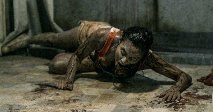 Mia (Jane Levy) is possessed by an army of demons in Fede Alvarez's gruesomely affectionate homage to the Sam Raimi classic.
