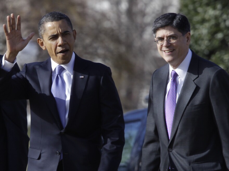 Office of Management and Budget Director Jack Lew walks with President Obama on the South Lawn of the White House on Monday.