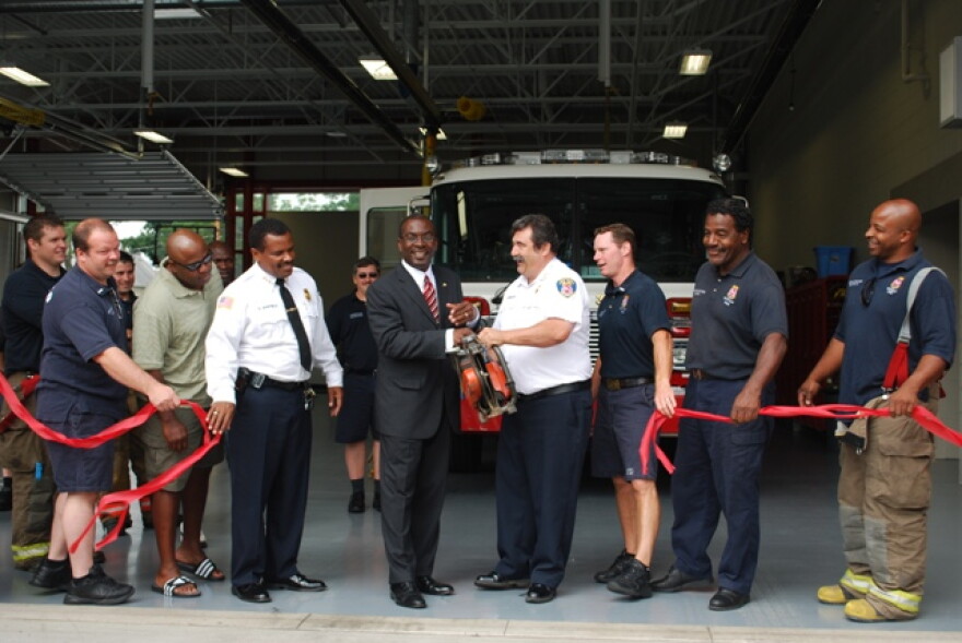 Mayor Brown officially cuts the ribbon on the new Bailey/Genesee Firehouse with Commissioner Lombardo and members of the Buffalo Fire Department