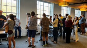 Park City residents and developers speak with Environmental Protection Agency and Utah Department of Environmental Quality officials about the Richardson Flat toxic soils clean-up plan during an open house.