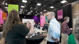 People talk at a networking event in WOSU's Ross Community Studio.