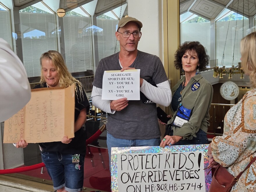 Supporters of new restrictions on transgender healthcare and sports participation gathered outside the N.C. House chamber ahead of Wednesday's veto override votes.