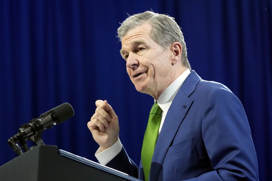 North Carolina Gov. Roy Cooper speaks, May 2, 2024, in Wilmington, N.C.Democratic Gov. Roy Cooper on Friday, June 21, 2024, vetoed North Carolina's masking bill that previously removed a pandemic-era exemption that allowed people to mask in public for health reasons. (AP Photo/Alex Brandon, file)