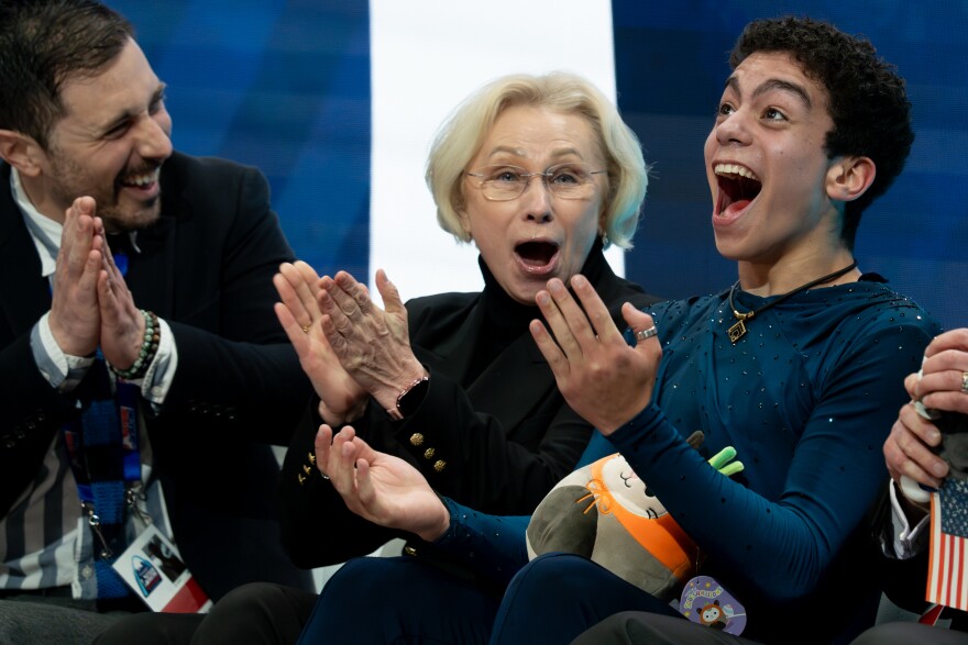 Jacob Sanchez reacts alongside his coaches after competing in the men’s free skate during the 2026 U.S. Figure Skating Championships at the Enterprise Center on Saturday, Jan. 10, 2026, in St. Louis’ Downtown West neighborhood. Sanchez took the pewter medal in the contest.