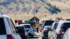 Ranger directing traffic at the north entrance of Yellowstone State Park on June 26, 2017, in Wyoming. A new engagement survey shows that working at a national park is no picnic.